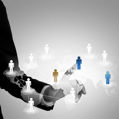 Social Network concept : hand point to social network and world map